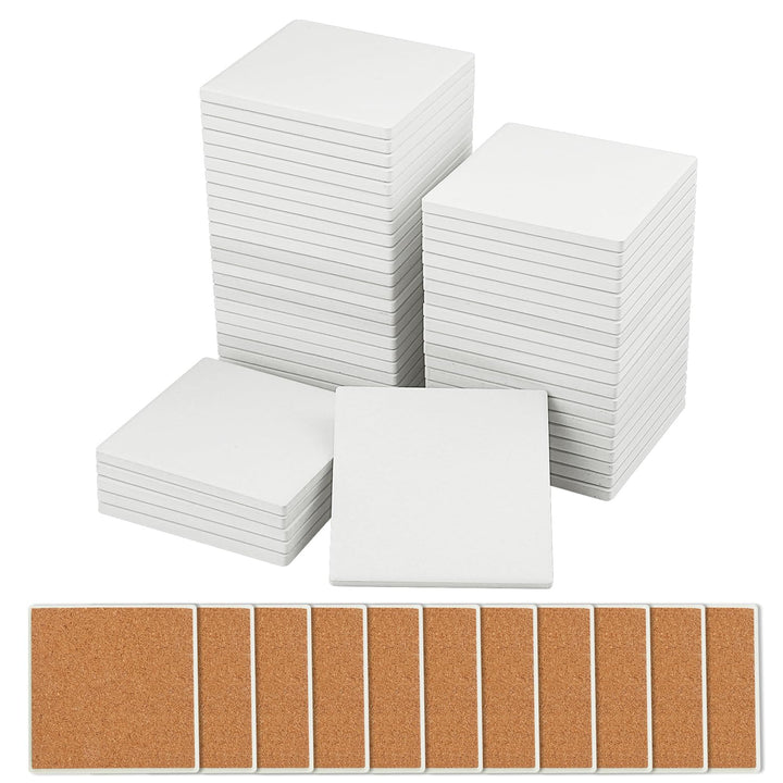 GNIEMCKIN blank ceramic coaster tiles ready for painting and crafting on an absorbent surface
