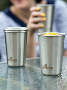 Greens Steel four-pack pint cups stacked for compact storage.