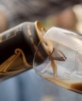 Guinness Gravity pint glass 20oz dishwasher-safe, easy cleanup after gatherings.
