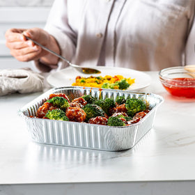 GUSTO 8x8 square foil pan in oven for even cooking.