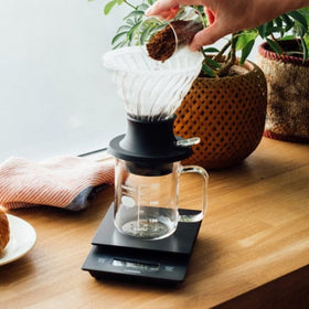 Hario Switch Dripper in use shows hybrid brewing in action.
