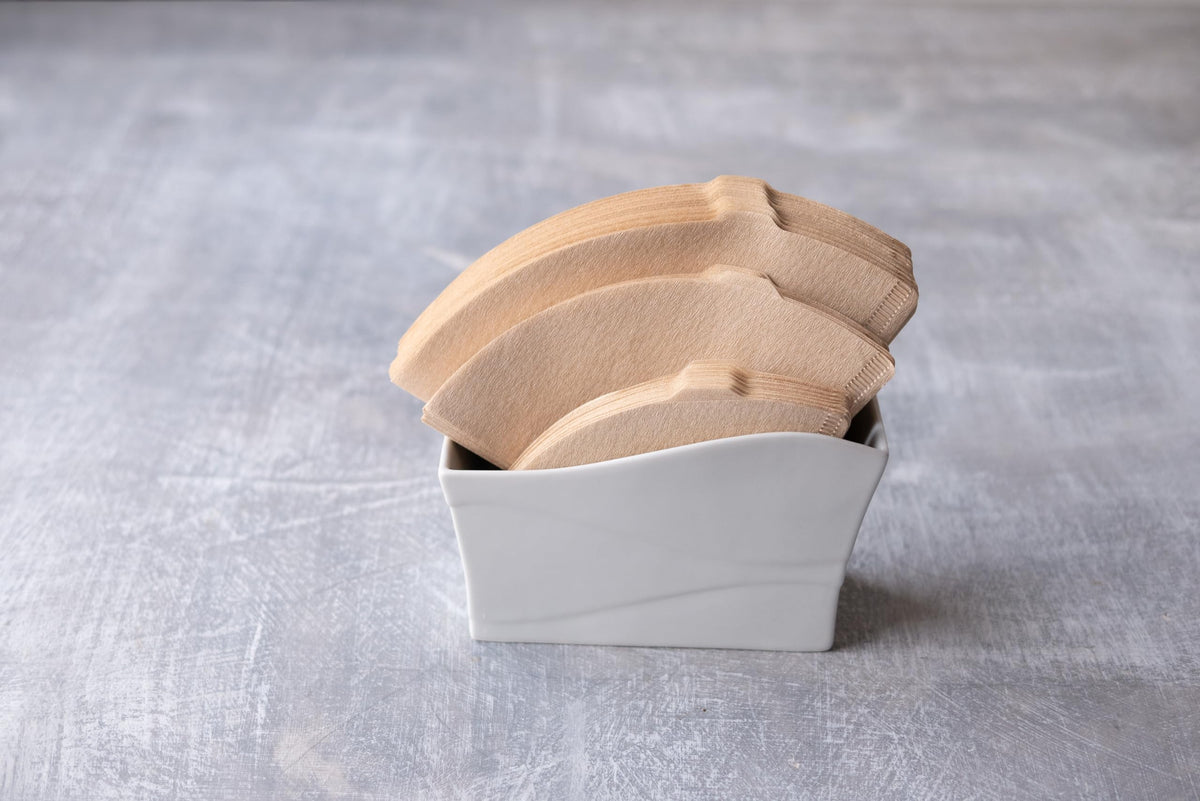 Stacked HARIO V60 Size 01 filters ready for use.