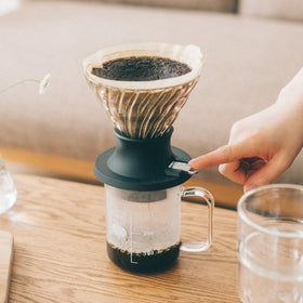 Hario V60 size 03 filters pack included for easy setup.
