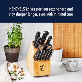 Henckels ergonomic triple-rivet handle for comfortable, fatigue-free prep.