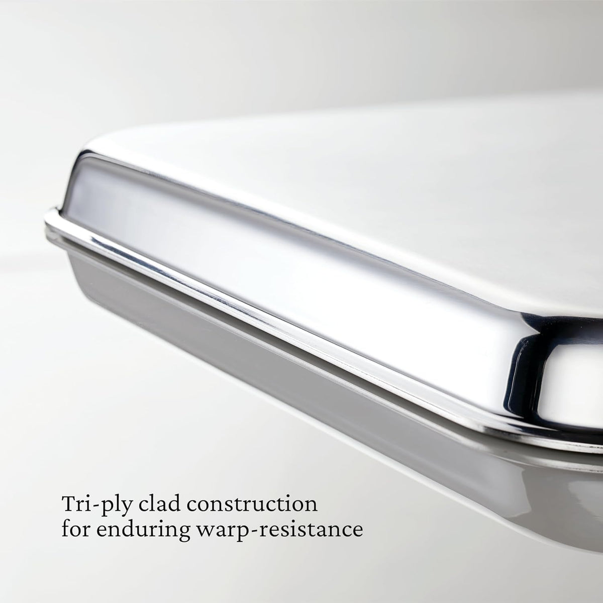 Hestan OvenBond wide curved handles provide a secure, mitt-friendly grip.