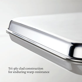 Hestan OvenBond wide curved handles provide a secure, mitt-friendly grip.