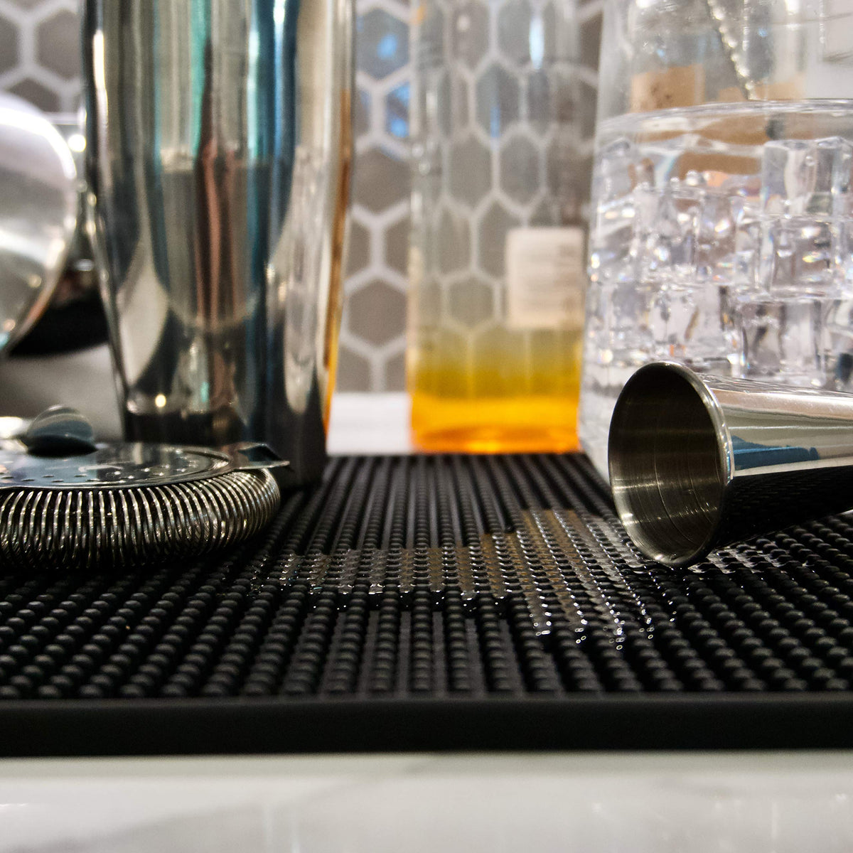 Highball & Chaser bar mat is dishwasher safe for quick cleaning and reuse.