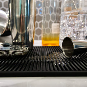 Highball & Chaser bar mat is dishwasher safe for quick cleaning and reuse.