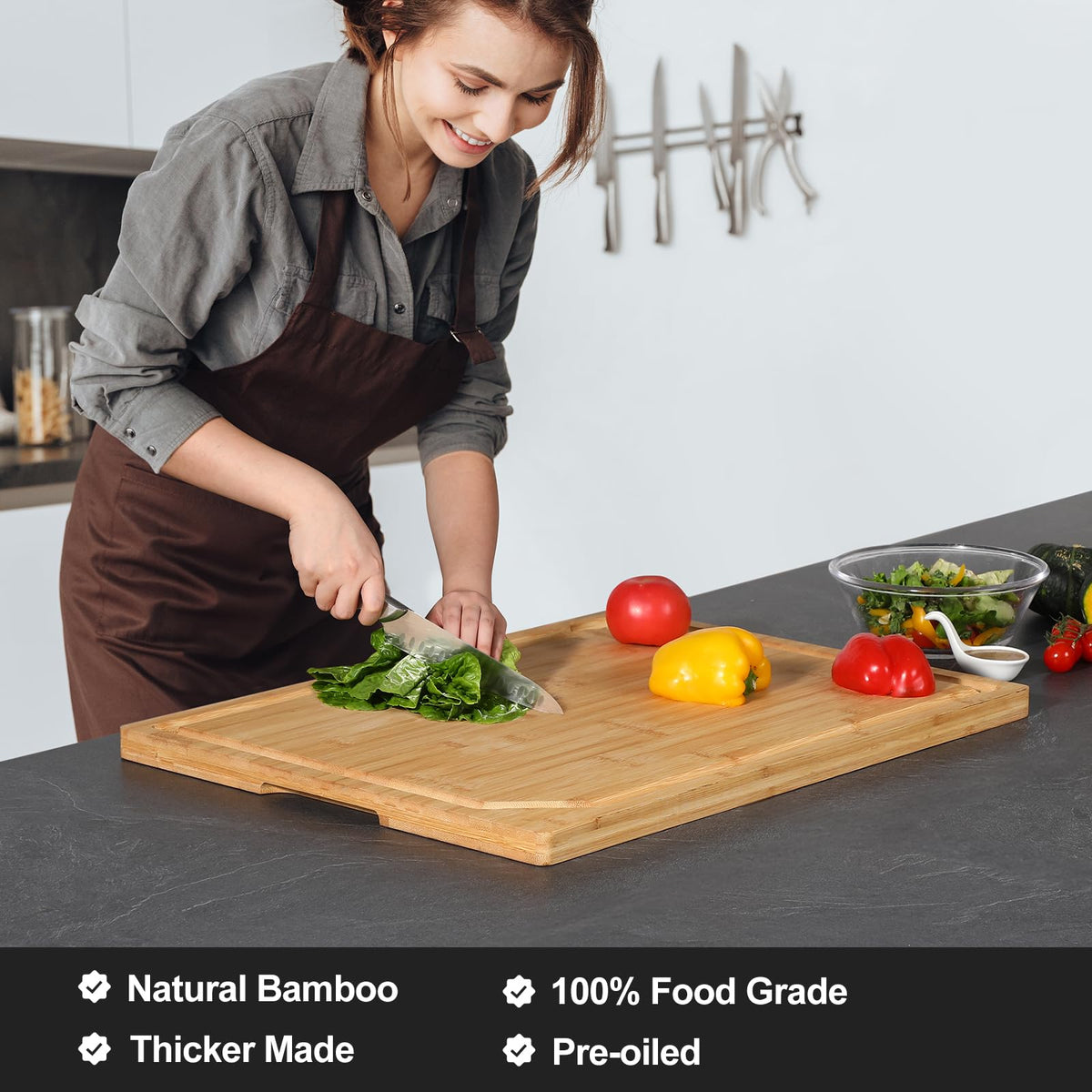 HIWARE cutting board with built-in handle for easy transport around the kitchen.