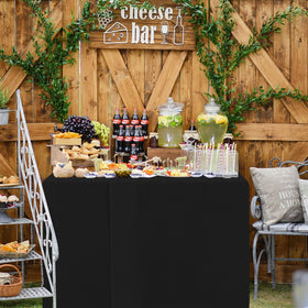 HolidayIdeas machine-washable tablecloth for quick post-event cleanup.