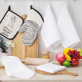 Folded Homaxy dishcloths in a tidy kitchen drawer for compact storage.