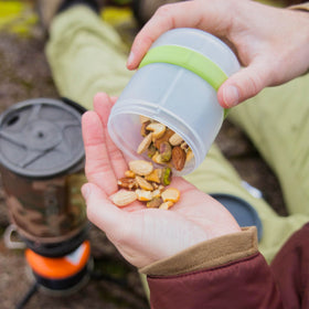 Humangear Stax 4-piece set keeps pills, spices, and small items neatly organized during travel.
