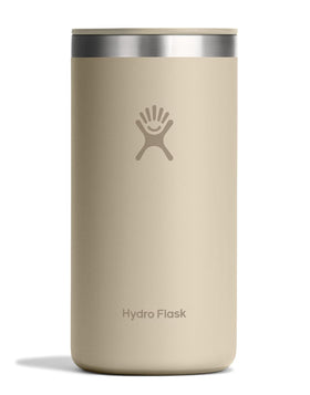 Hydro Flask Travel Coffee Cup 16oz oat tan shown in hand for on-the-go hot coffee.