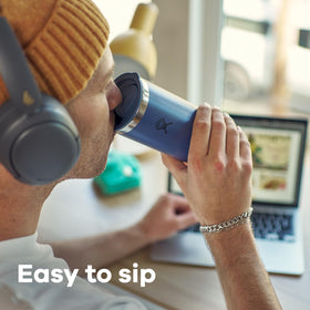 Hydro Flask Travel Coffee Cup side profile highlights sleek splash-resistant design