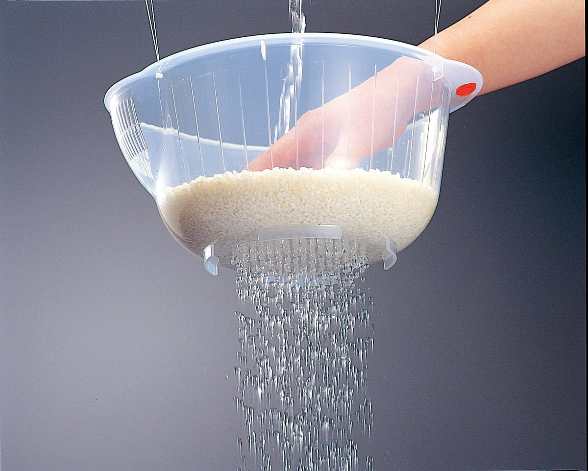 Inomata Rice Washing Speed Bowl with bottom drain for thorough water flow and debris removal.