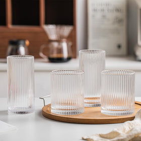 INSETLAN ribbed-glass set ideal for outdoor entertaining.