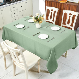 IVAPUPU buffet line with sage green tablecloth creating a cohesive look