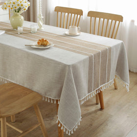 JIALE brown rectangle tablecloth 55 x 70 inches on dining table for 4–6 seats.