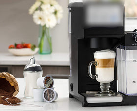 J&M DESIGN sugar dispenser at a coffee bar setup for everyday use.