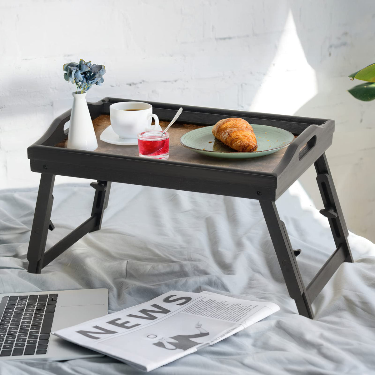 Sturdy folding legs keep a steady surface on couch or floor
