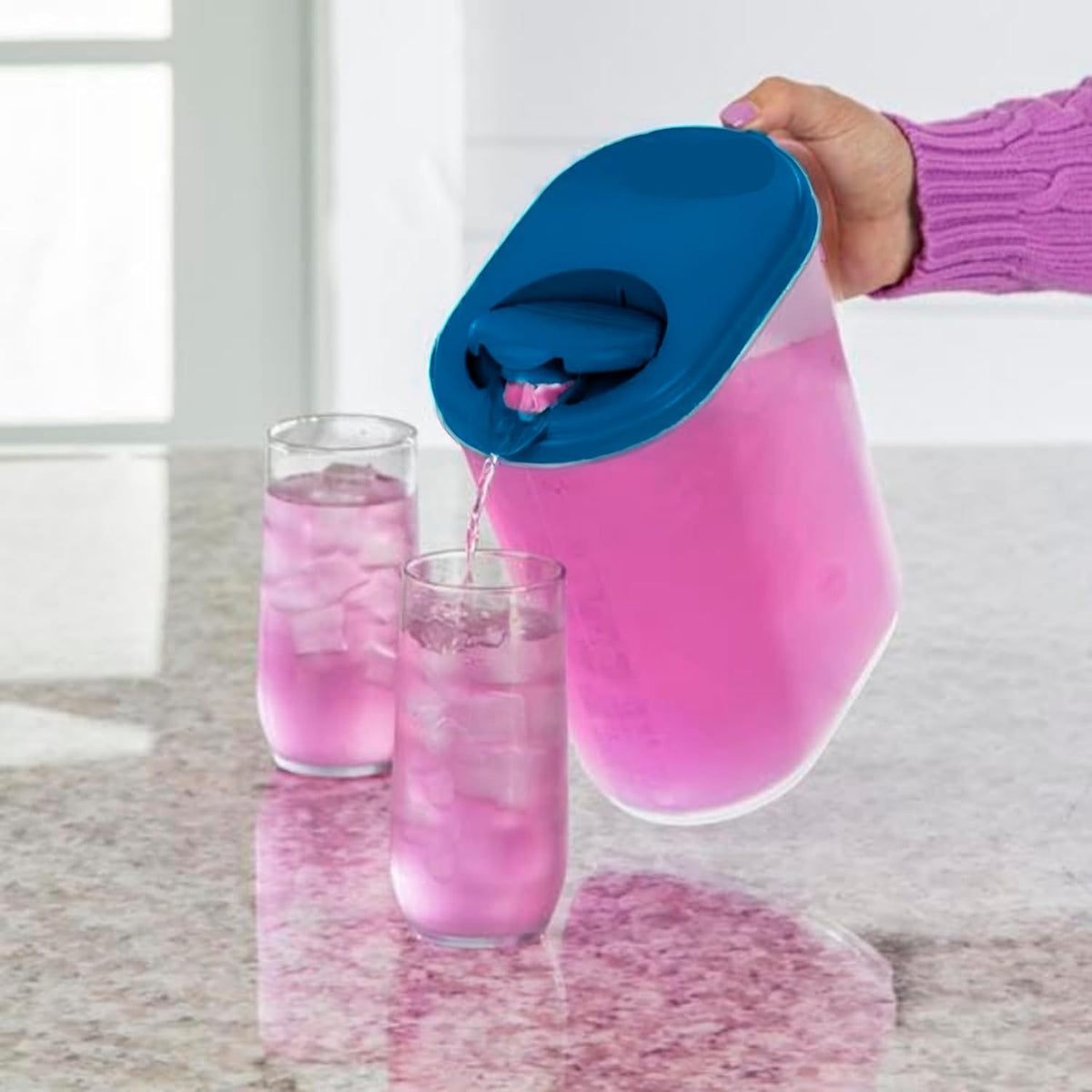 JOEY'Z pivot-top spout pitcher in action, spill-free pouring