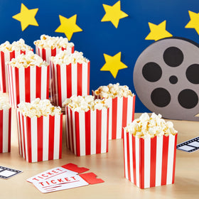 Juvale mini popcorn boxes displayed at a party setup for snacks