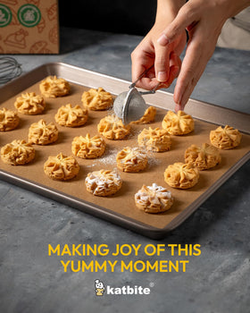 Katbite 200Pcs parchment sheets help keep trays clean after cooking.