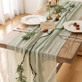 Keketoarrange sage green table runner with draped hem for elegant tables.