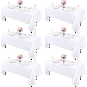 Kesfey six-pack white tablecloths 60x84 flatlay showing clean, versatile event textiles.