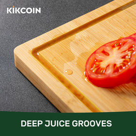 Kikcoin bamboo cutting board built-in handle for easy lifting.