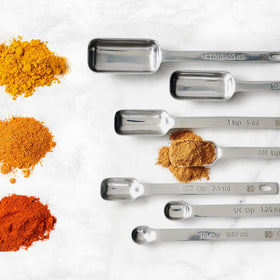 Slim, long-handled design helps reach tall jars and narrow bottles