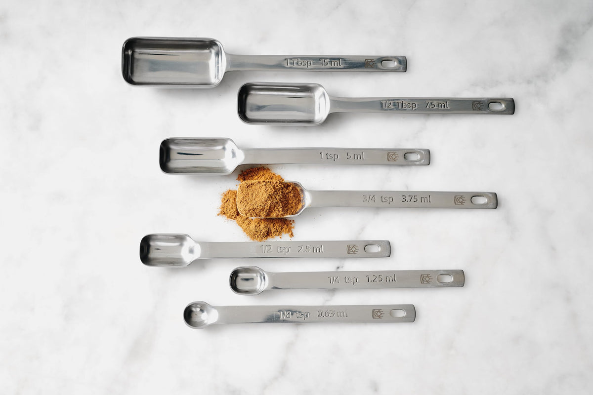 Nestable spoons with a hanging option to keep drawers organized