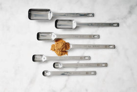Nestable spoons with a hanging option to keep drawers organized