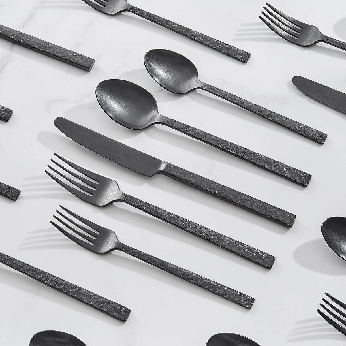 Kingstone teaspoons in black hammered flatware for precise scooping