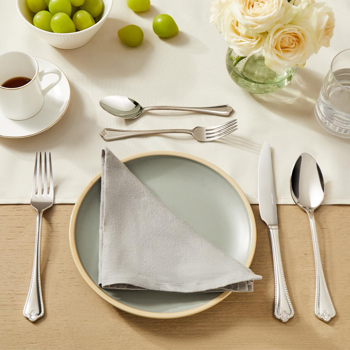 Kingstone mirror finish closeup image: gleaming surface enhances any table setting