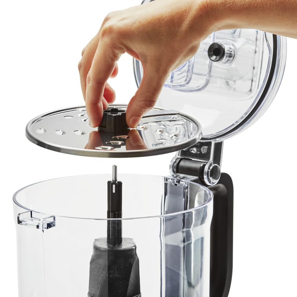 KitchenAid lid with latch assures secure, mess-free processing.