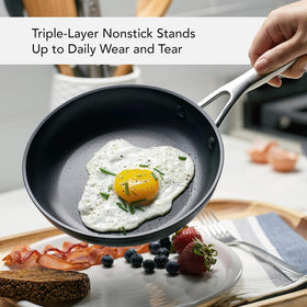 Riveted handles with nonstick interior on KitchenAid cookware.