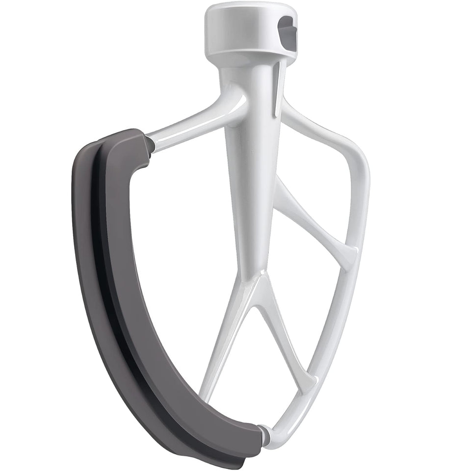 KITCHPOWER Flex Edge Beater side-scrape shows thorough bowl scraping for even mixing.