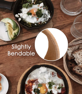 KITLAB round cork pot holders safeguard tabletops during meals.