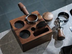 KNODOS coffee brush and tamper mat holder arranged for quick maintenance and workflow