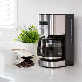 Koolatron Kenmore glass carafe shows 12-cup capacity for gatherings.