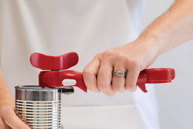 Kuhn Rikon Auto Safety Master Opener with lock-on for steady grip.
