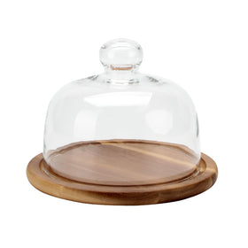KVMORZE 8.6 inch cake stand with glass dome displaying cake at a party