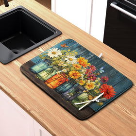 Kwlegh Daisy dish drying mat showcases vintage floral print for stylish kitchens.