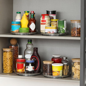 LANDNEOO 10-inch clear lazy susan on countertop keeps items reachable.