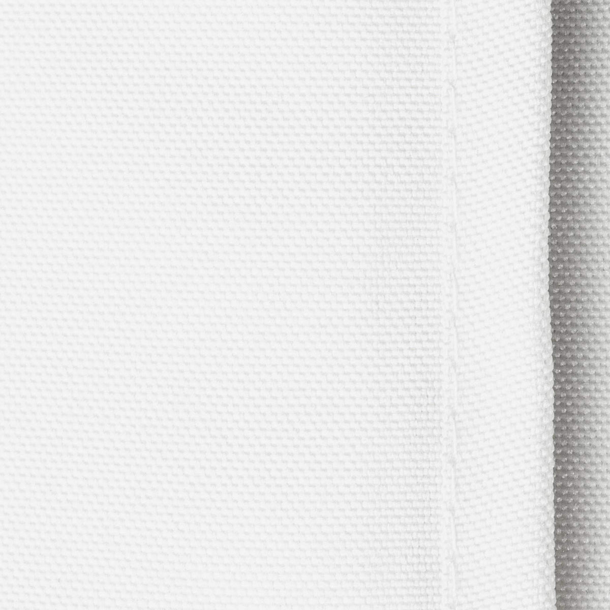 Folded Lann's Linens 90-inch round tablecloth ready for easy storage and setup.