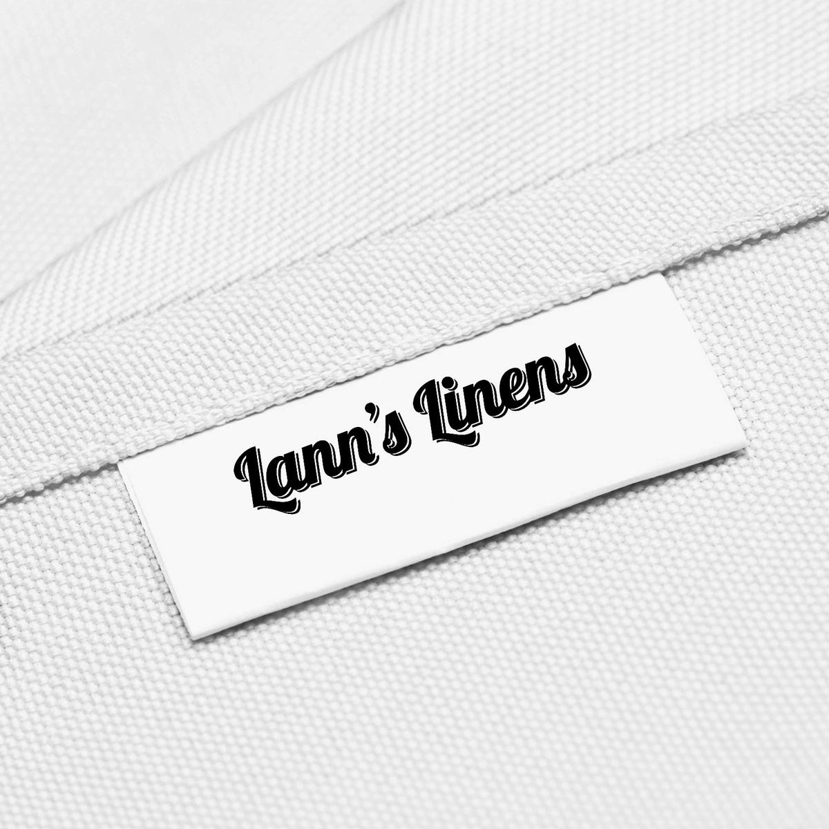 Close-up shows stain-resistant polyester of Lann's Linens 90-inch round tablecloth.