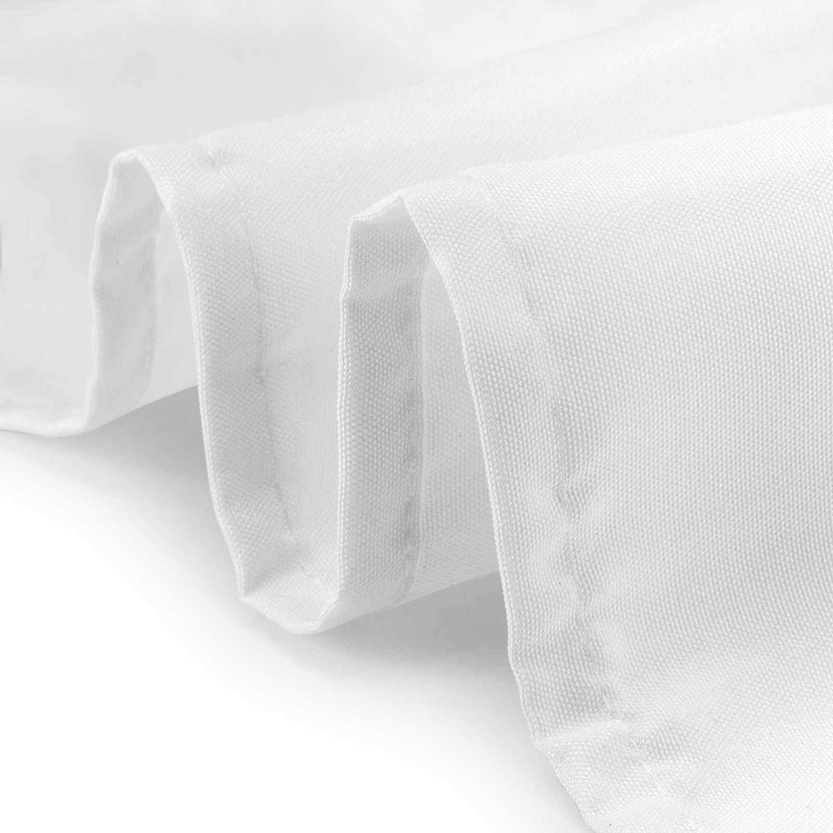 Wrinkle-free drape of Lann's Linens 90-inch round tablecloth on a banquet table.