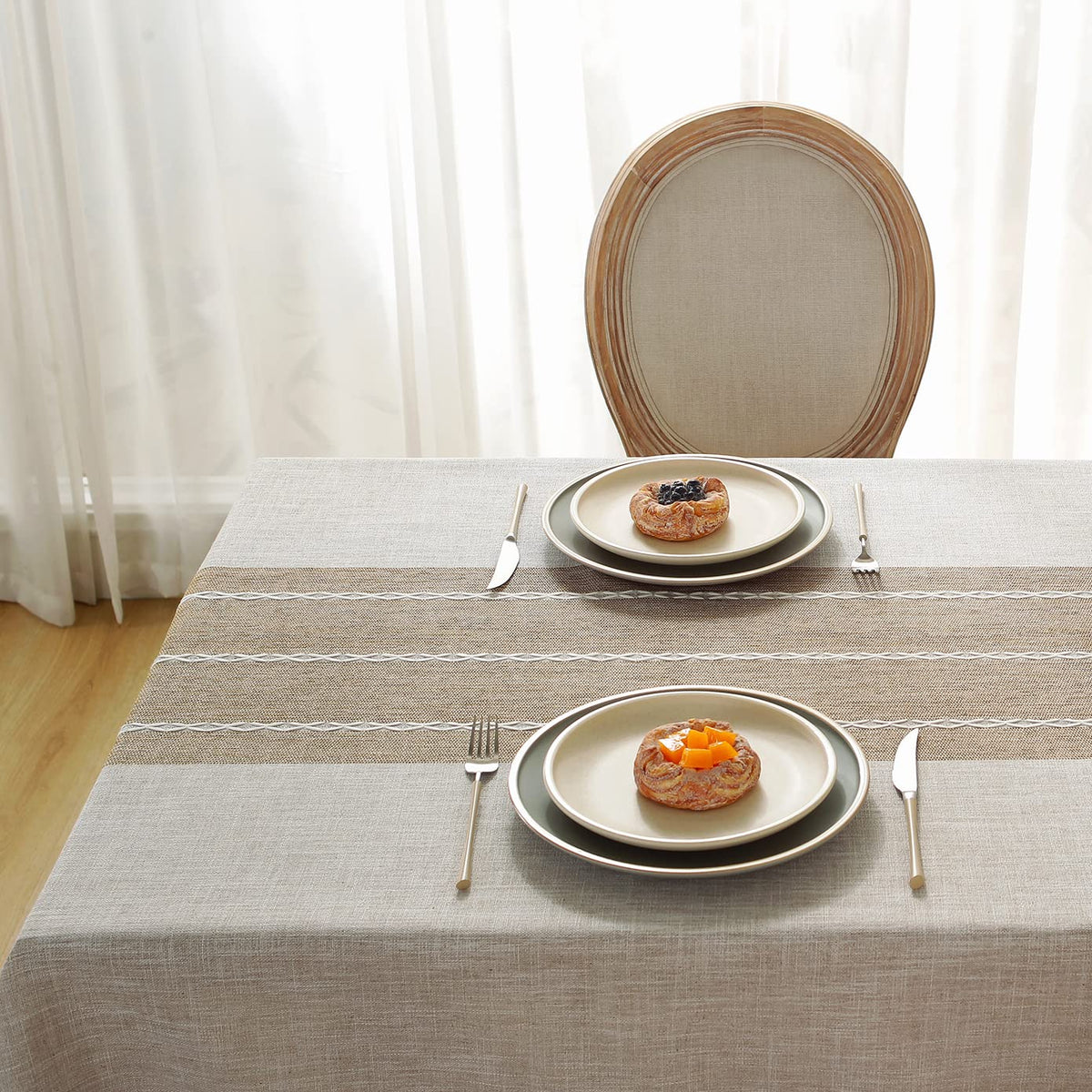 Laolitou tablecloth with water-repellent coating helps spills bead up for quick cleanup.