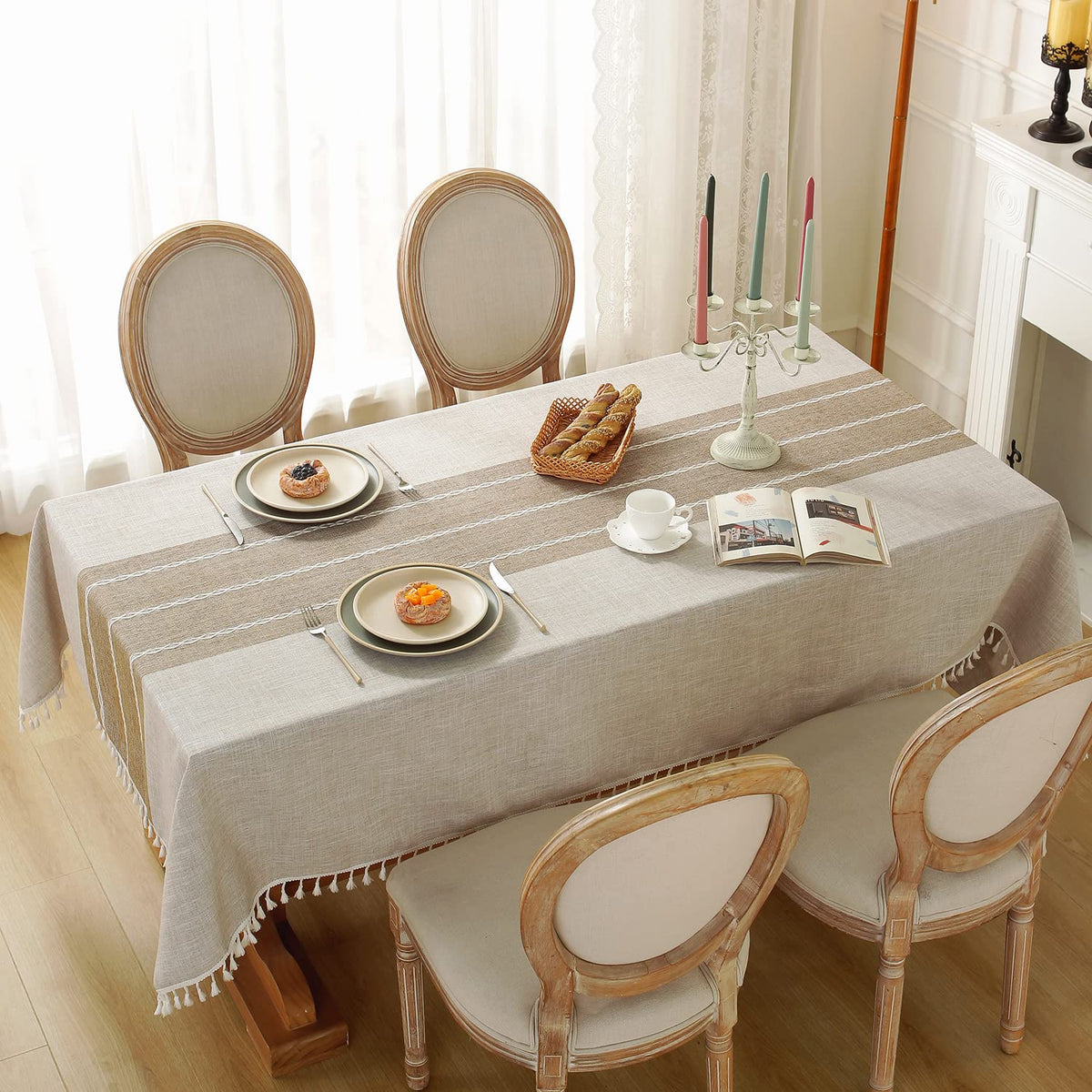 Laolitou rustic tablecloth's waterproof coating protects surfaces and wipes clean after spills.
